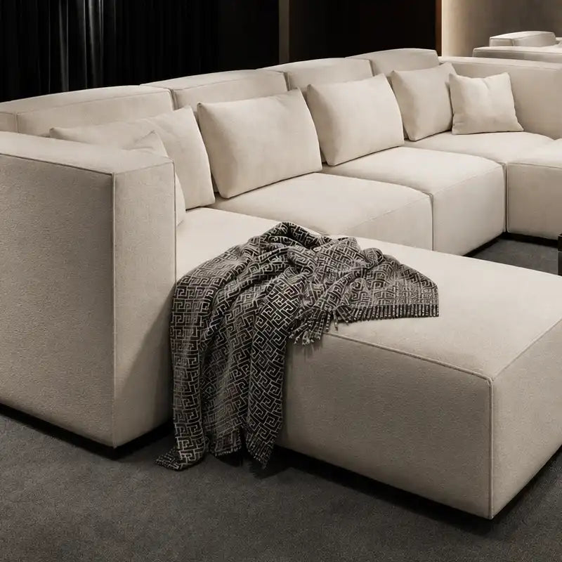 Cinema Deco Mayfair luxury modular cinema seating in cream fabric with deep chaise seating and scatter cushions
