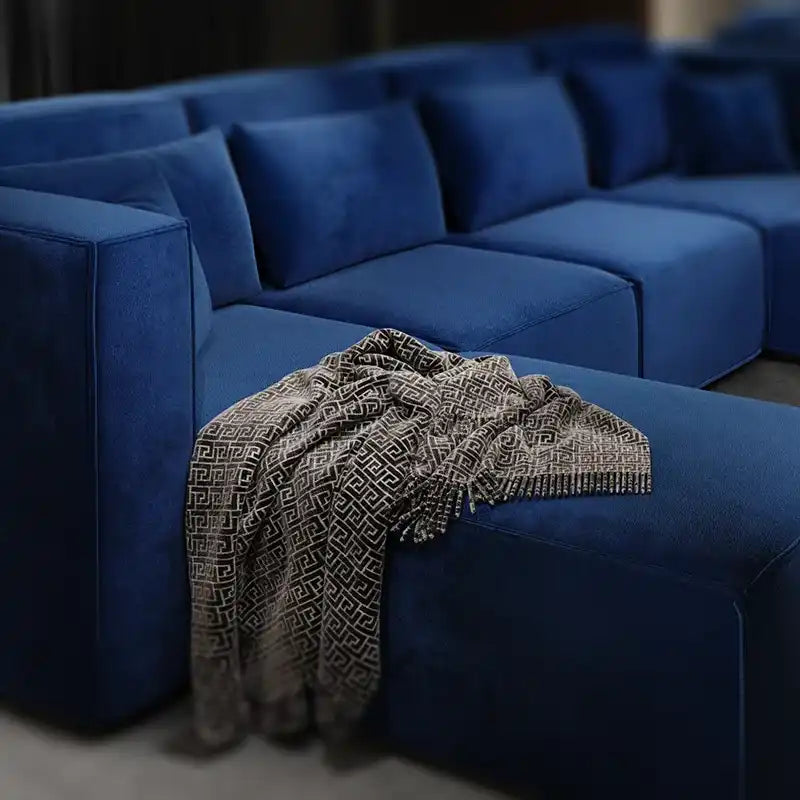 Cinema Deco Mayfair luxury modular cinema seating in deep blue fabric with flexible sofa and chaise configuration