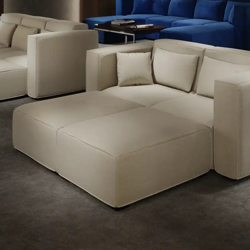 Cinema Deco Mayfair luxury modular cinema seating in cream fabric with an extended chaise configuration and deep cushioned seating