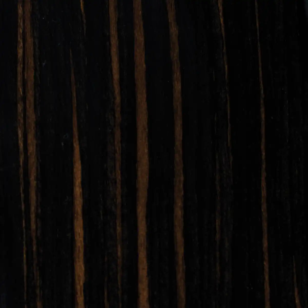 Carbon wood finish swatch with near-black grain and vertical brown streaks